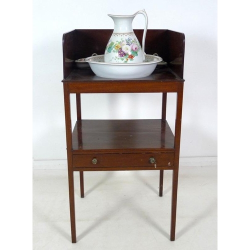 938 - An Edwardian mahogany wash stand, with three quarter gallery, single drawer, raised on square sectio... 