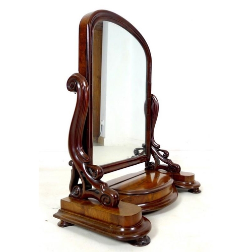 942 - A Victorian mahogany toilet mirror, domed rectangular plate, shaped supports, lift lid glove / trink... 