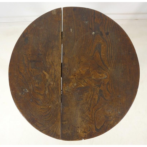 944 - An 18th century cricket table, with circular elm surface, later base with three tapering legs, 58.5 ... 