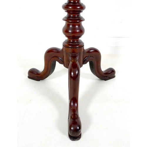 947 - A Victorian mahogany occasional table, circular surface with moulded edge, turned column raised on t... 