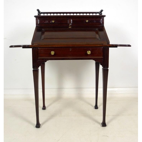 948 - An Edwardian mahogany fall front bureau, by Holliday Son & Co, with galleried top and serpentine dro... 