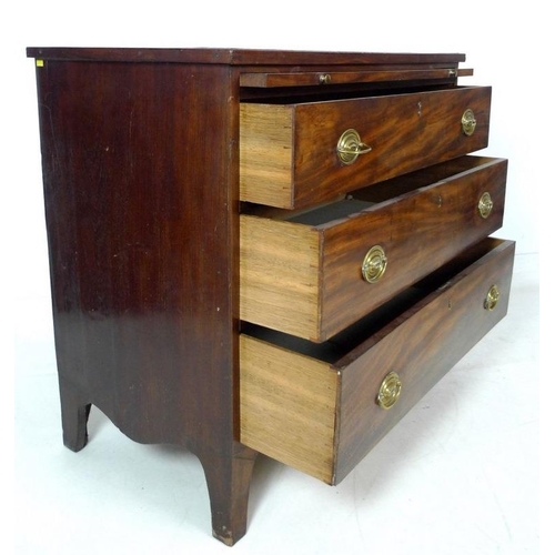 965 - An early Victorian mahogany veneered and pine cased chest of three graduating drawers, with brushing... 