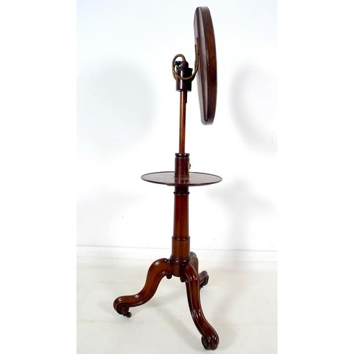 966 - An early Victorian mahogany shaving stand, circular plate in moulded frame supported on a ratchet ad... 