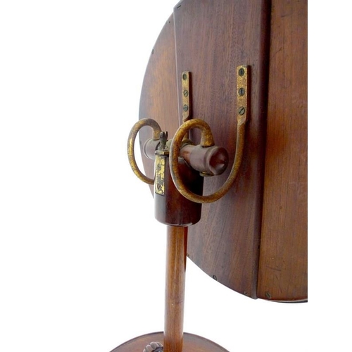 966 - An early Victorian mahogany shaving stand, circular plate in moulded frame supported on a ratchet ad... 