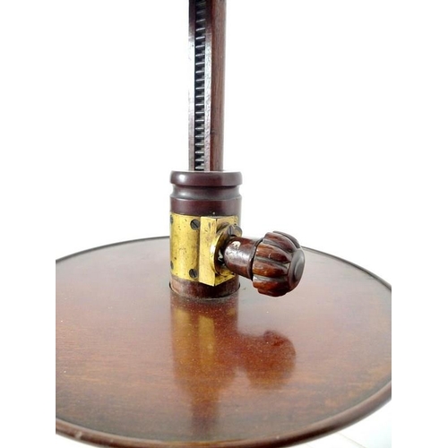 966 - An early Victorian mahogany shaving stand, circular plate in moulded frame supported on a ratchet ad... 