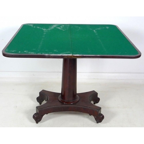 967 - A William IV flame mahogany card table, swivel and fold over surface, raised on a plain gun barrel c... 