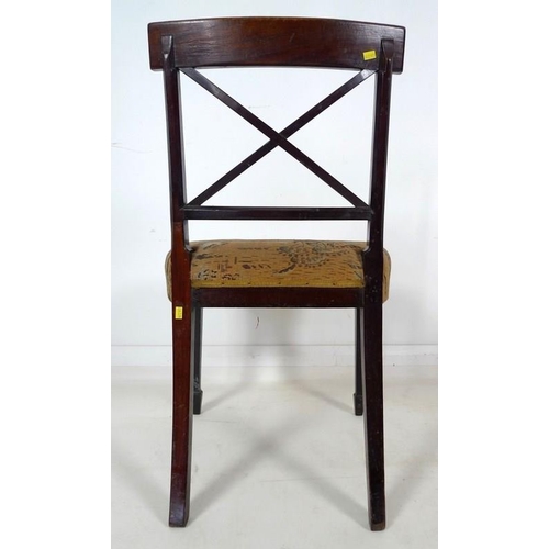 968 - A set of six late George III mahogany dining chairs, with reeded decoration, X shaped back, curved r... 