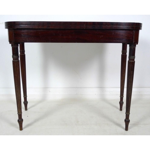 970 - A Regency mahogany card table, D form fold over surface with ebony stringing, revealing a pink baize... 