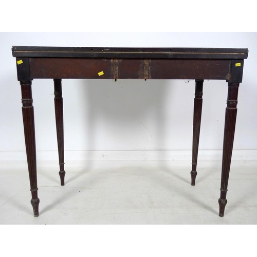 970 - A Regency mahogany card table, D form fold over surface with ebony stringing, revealing a pink baize... 