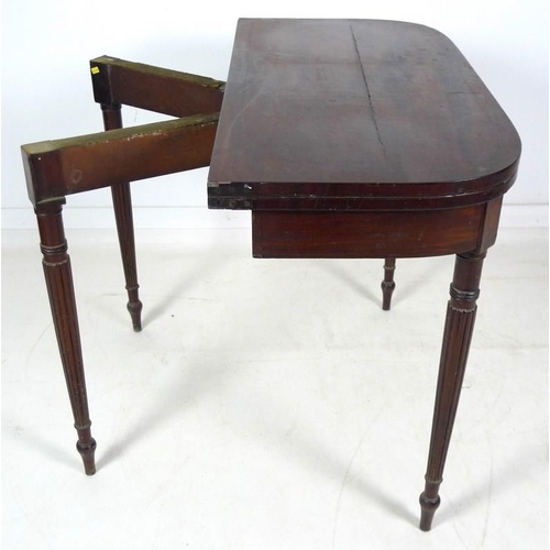 970 - A Regency mahogany card table, D form fold over surface with ebony stringing, revealing a pink baize... 