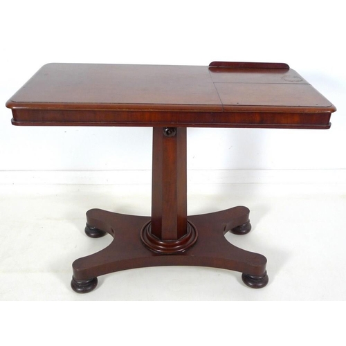 975 - A Victorian mahogany reading table, with adjustable height and twin adjustable height book rests, th... 