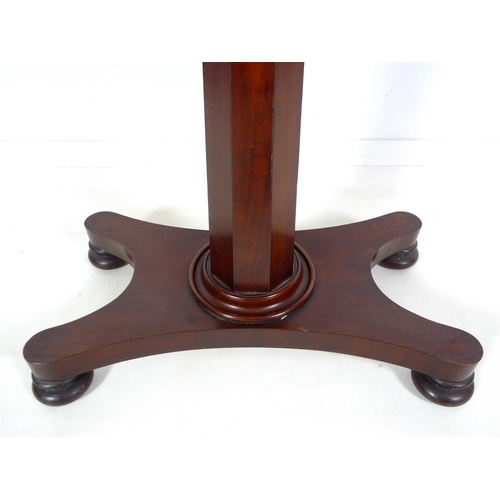 975 - A Victorian mahogany reading table, with adjustable height and twin adjustable height book rests, th... 