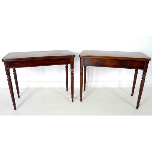 978 - A pair of Regency mahogany tea tables, the D form fold over surfaces with moulded edges, above plain... 