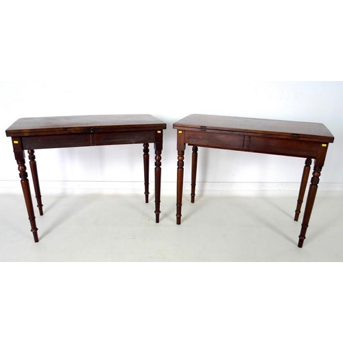 978 - A pair of Regency mahogany tea tables, the D form fold over surfaces with moulded edges, above plain... 