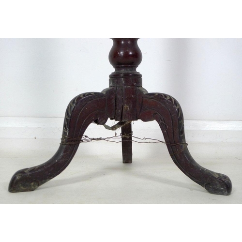 979 - An early Victorian mahogany candle stand, circular dished surface on an adjustable column with brass... 