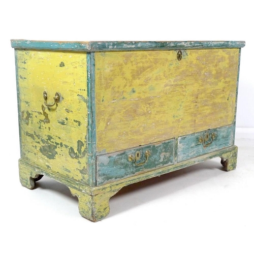 980 - A Victorian painted mule chest, yellow green distressed finish, with two drawers, brass swan neck ha... 