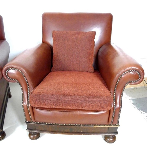 982 - A brown leather three piece suite, mid 20th century, comprising a three seater sofa, 180 by 83 by 90... 