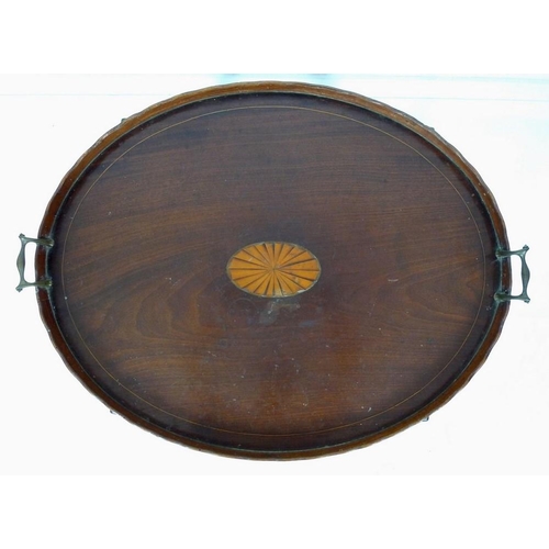 987 - A late George III mahogany tray table, large oval tray with fan patera inlay, line border, a shaped ... 