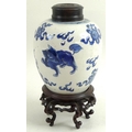 A Chinese porcelain ginger jar, 18th /19th century, decorated in Kangxi style with three kylin among... 