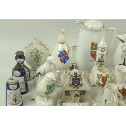 518 - A large collection of crested wares, including a Shelly model of the Silchester Vase, a Milton crest... 