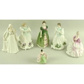 A collection of Royal Doulton figurines, comprising 'Figure of the Month March' HN2707, boxed, 20cm,... 