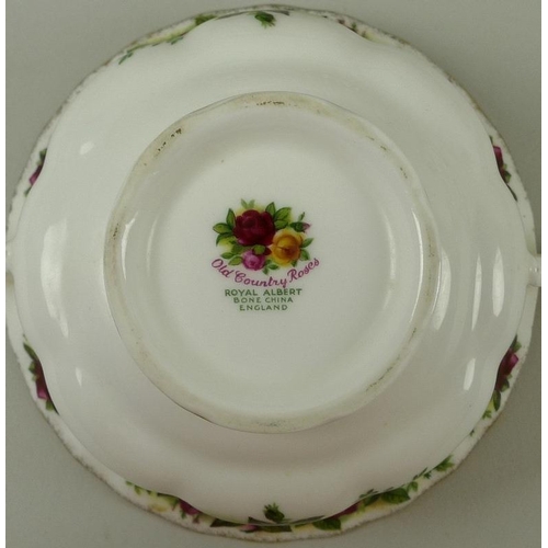 524 - A Royal Albert part dinner service, decorated in the Old Country Roses pattern, comprising gravy boa... 