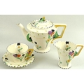 A Burleighware Art Deco china part tea set, decorated in the Fragrance pattern, comprising tea pot, ... 