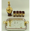 A collection of ruby and gold Murano glass ware, comprising a tray with an etching of two figures, 2... 