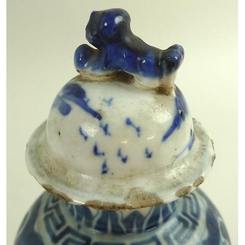 544 - A collection of Chinese ceramics, including a 19th century jug, with twin strap handle terminating i... 