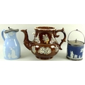 A selection of ceramics, comprising an A T R Boote Patent Mosaic blue jug decorated with Greek motif... 