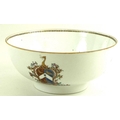 A Chinese Export armorial porcelain bowl, late 18th century, decorated with four heraldic crests and... 
