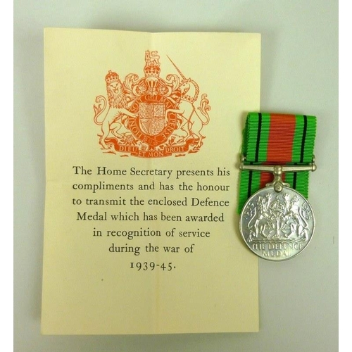 640 - A group of medals, comprising a WWI British War medal, a Service Medal of the Order of St John with ... 