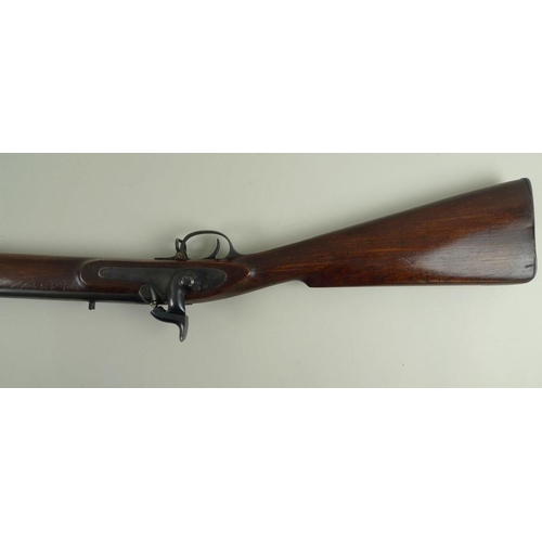 645 - A mid 19th century rifle, complete with ramrod and loops, barrel length 68cm, 125cm overall.