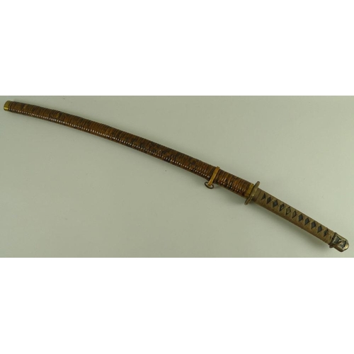 652 - A 19th century Japanese katana blade, 73cm, the tang signed Koka, with shagreen tsuka, later brass t... 