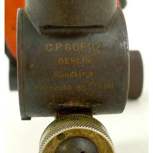 654 - A German WWI artillery dial sight, by C. P. Goertz, Berlin, with red painted centre section, stamped... 