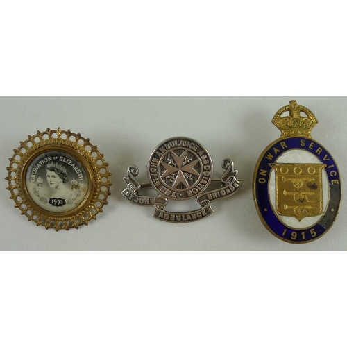 659 - A collection of enamel badges including two silver and enamel Royal Artillery badges, an On War Serv... 