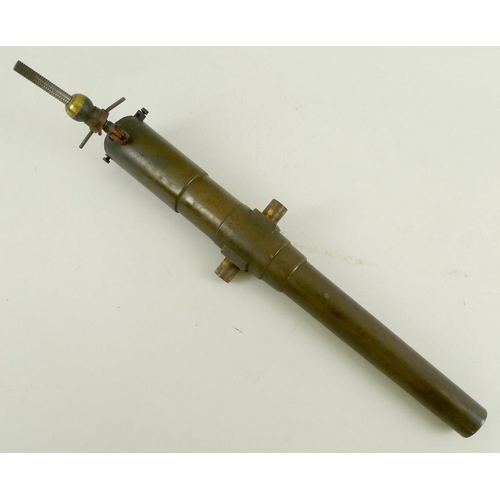 664 - A miniature artillery field gun, early 20th century, consisting of a patinated bronze barrel, with r... 