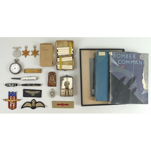 668 - A group of military related items, including a silver cigarette case with eight 'Players Medium Navy... 