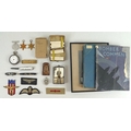 A group of military related items, including a silver cigarette case with eight 'Players Medium Navy... 