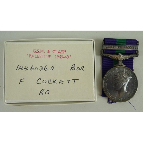 672 - A Palestine medal for Brigadier F Cockett RA, together with a pair of military hairbrushes, 8 by 9 b... 