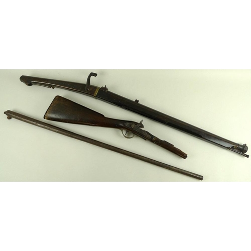 675 - An early 19th century percussion shotgun, with octagonal breech, damascus barrels, and brass trigger... 