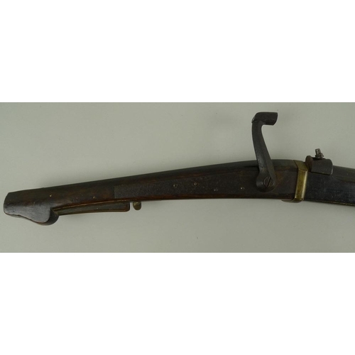 675 - An early 19th century percussion shotgun, with octagonal breech, damascus barrels, and brass trigger... 