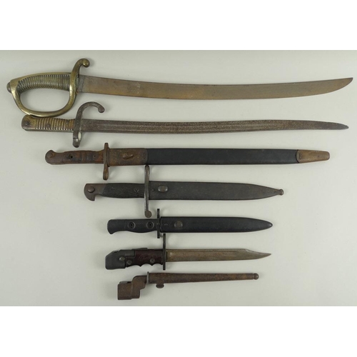 676 - A group of bayonets, 19th century and later, together with a cavalry officers sword, 74.5cm and smal... 