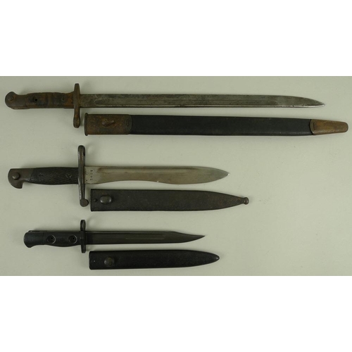 676 - A group of bayonets, 19th century and later, together with a cavalry officers sword, 74.5cm and smal... 