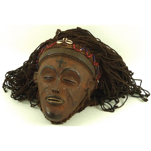 684 - A Mwana Pwo mask from Western Angola/ Eastern Zambia, circa 1970, used in ceremonial dances, 27cm hi... 