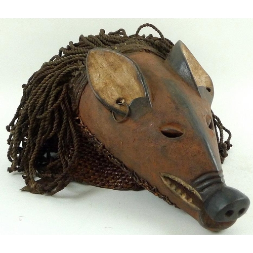 685 - A Chokwe ngulu (pig) mask from Western Angola, circa 1970, used in ceremonial dances, 40cm high.