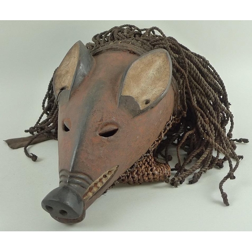 685 - A Chokwe ngulu (pig) mask from Western Angola, circa 1970, used in ceremonial dances, 40cm high.