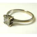 An 18ct gold and diamond solitaire ring, the princess cut diamond of approximately 0.7ct, size K/L, ... 