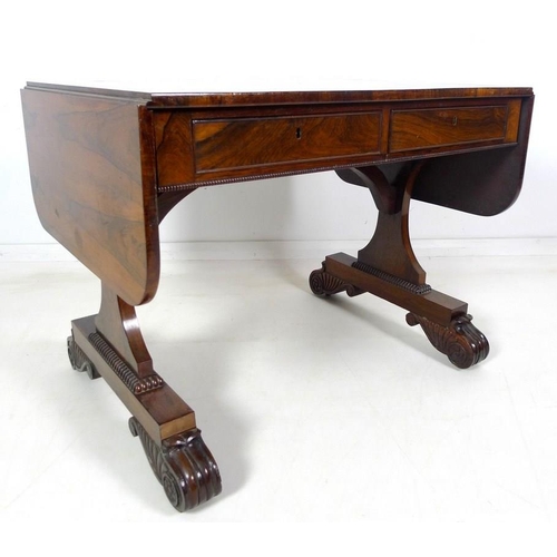 935 - A William IV rosewood sofa table, drop leaf ends, beaded lower edge, two frieze drawers opposite two... 