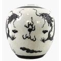 A Chinese porcelain dragon vase, 19th century, decorated in relief with two five clawed black dragon... 